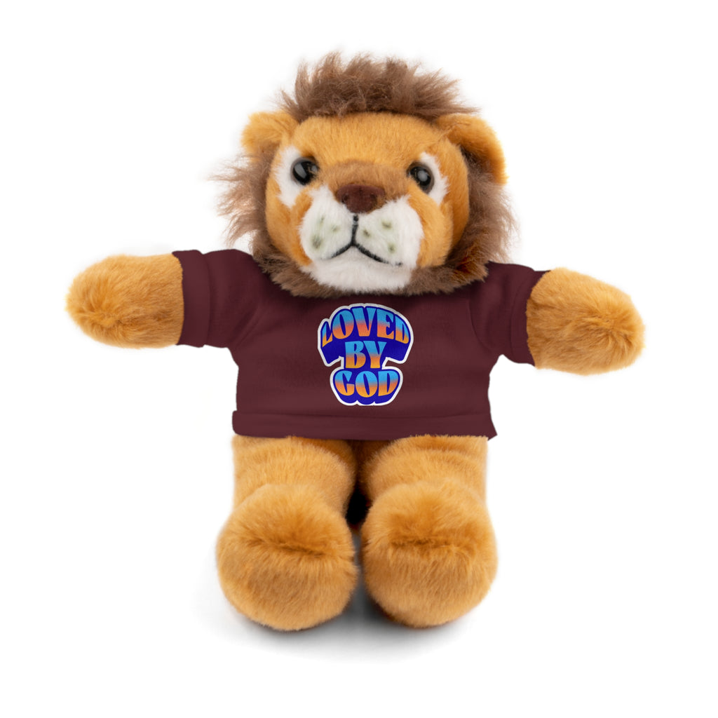 Plush lion toy wearing a maroon shirt with blue and orange "Loved by God" text on white background