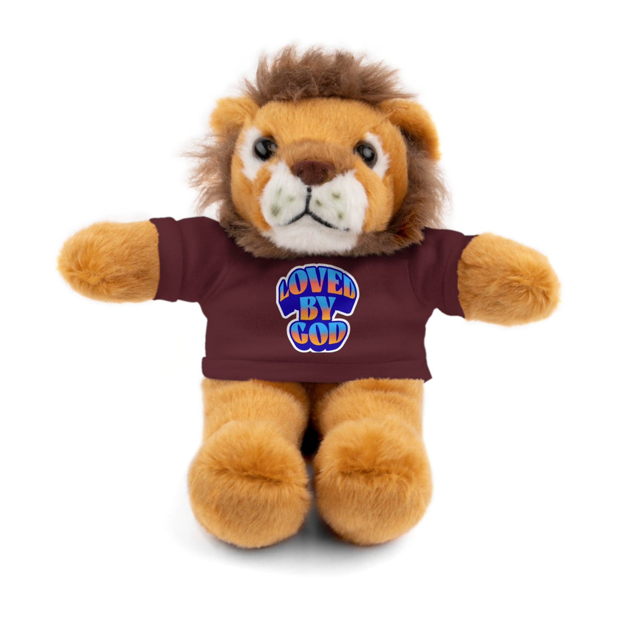 Plush lion toy wearing a maroon shirt with blue and orange "Loved by God" text on white background