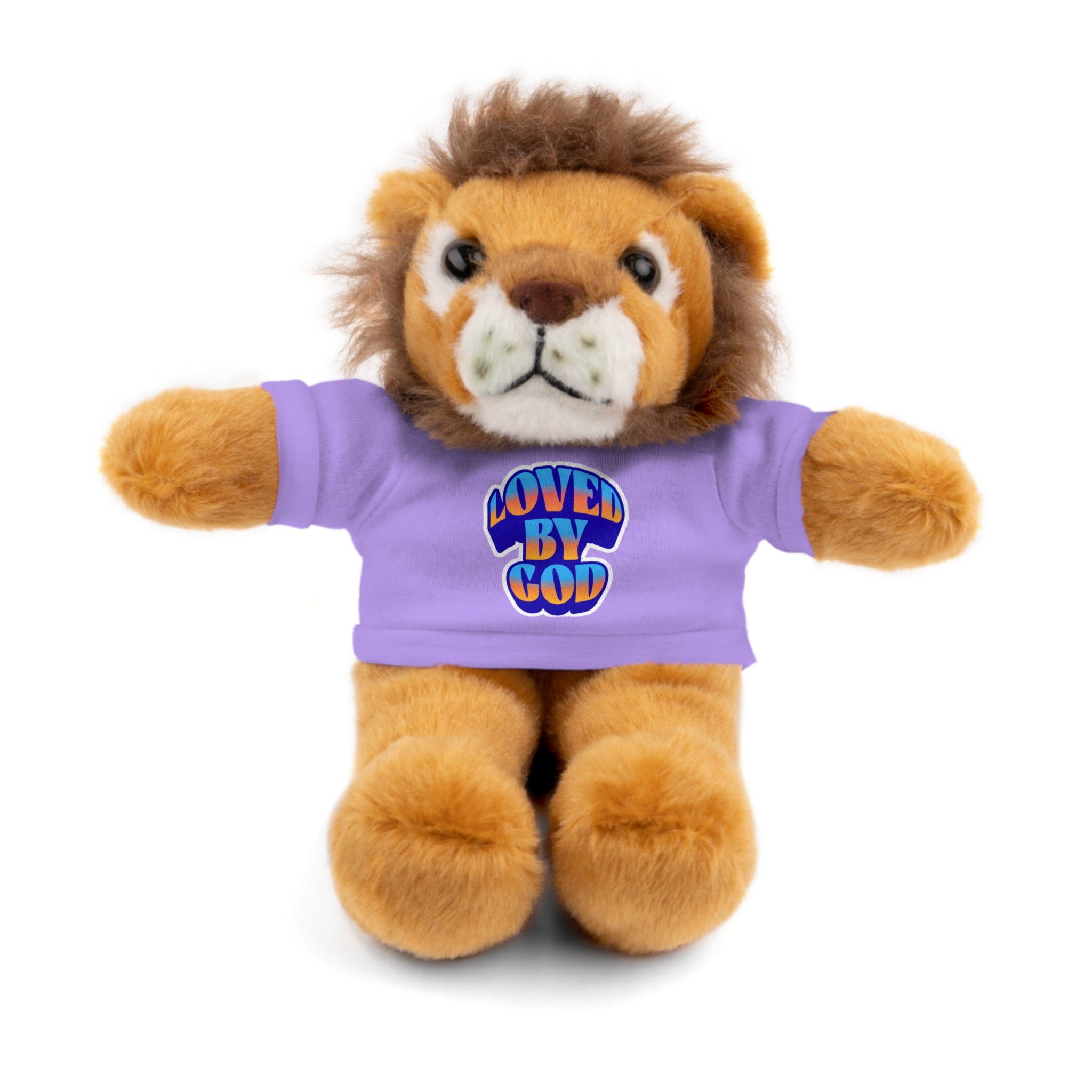 Plush lion toy wearing a purple shirt with colorful "Loved by God" text design on the front against a white background.