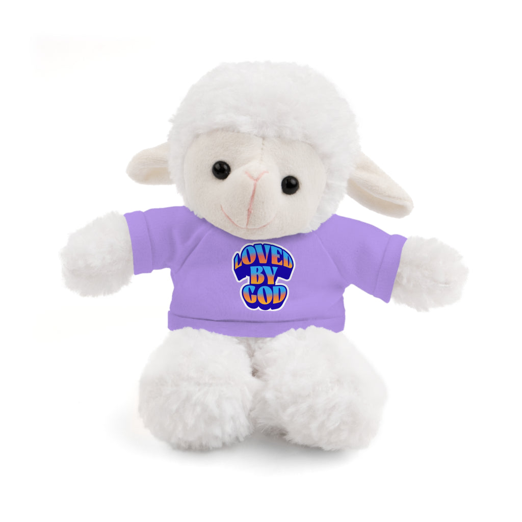 White plush lamb wearing a purple shirt with colorful "Loved by God" text sitting on a white background