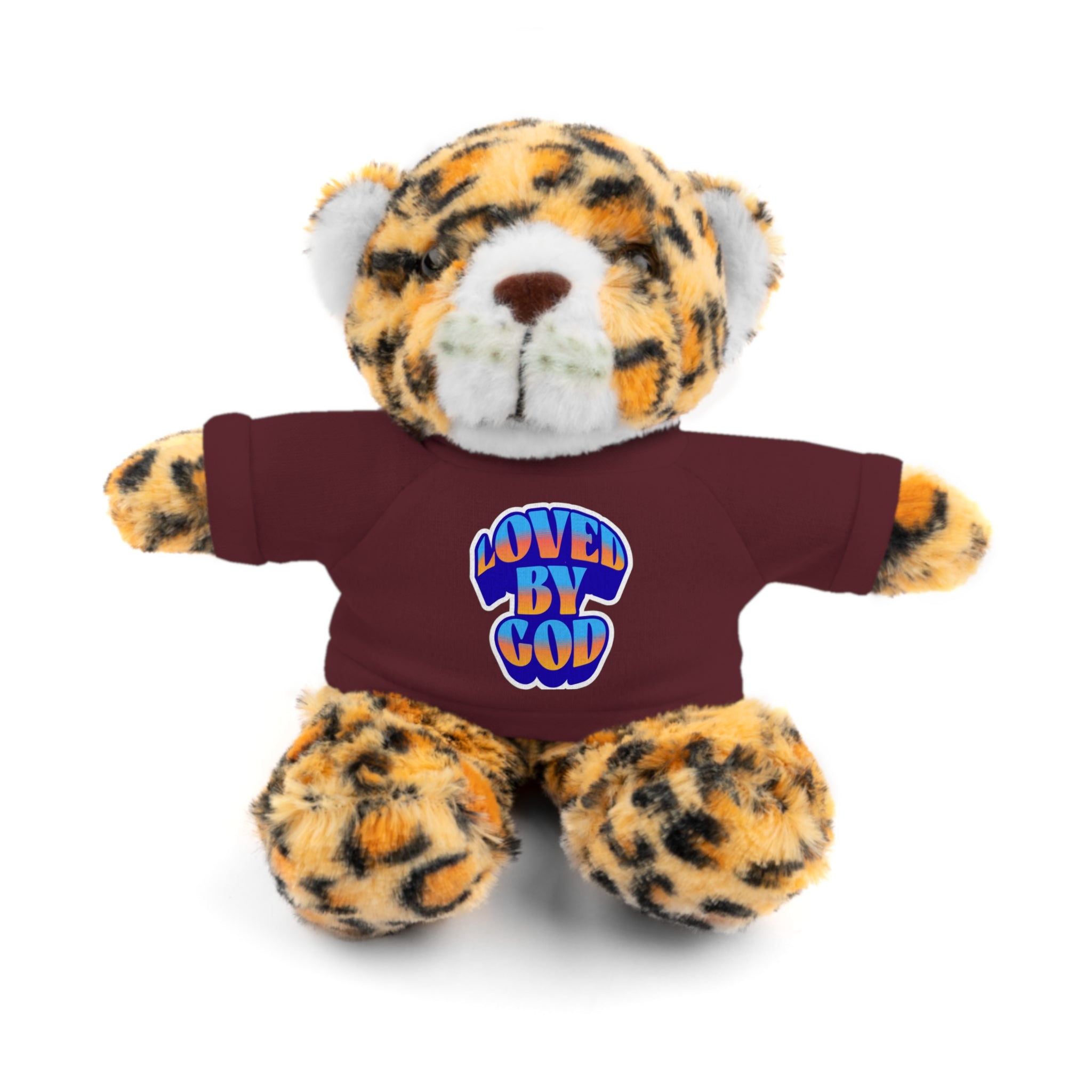 Plush leopard print teddy bear wearing a maroon shirt with colorful "Loved by God" text on the front.